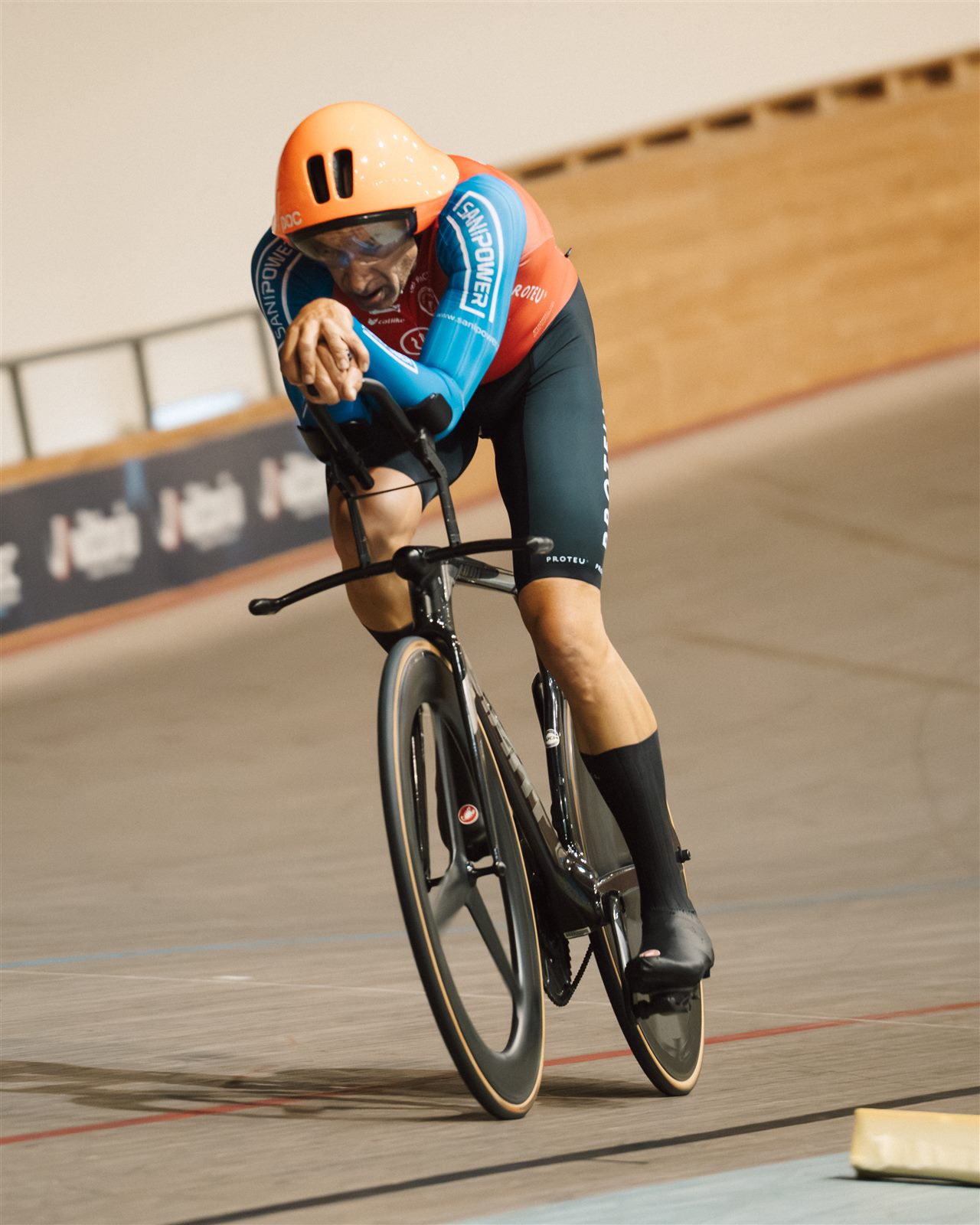 An athlete mid-effort on the track