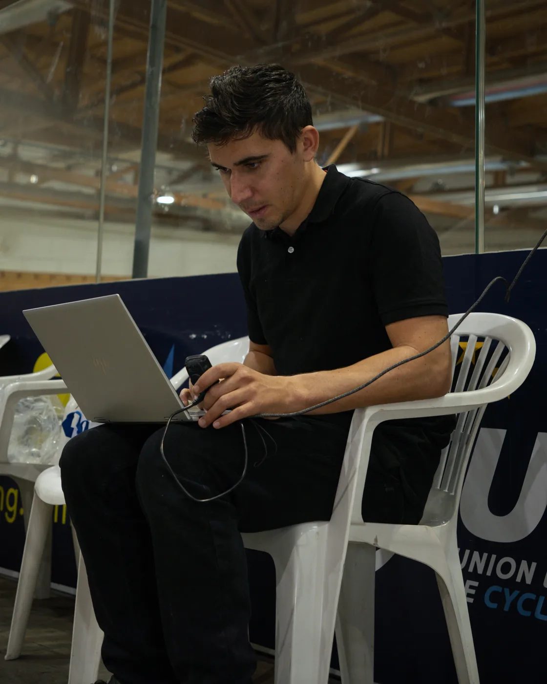 Bernardo Gonçalves reading test data at the trackside